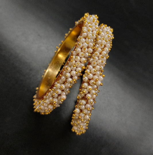 GUTTAPUSALU BANGLES